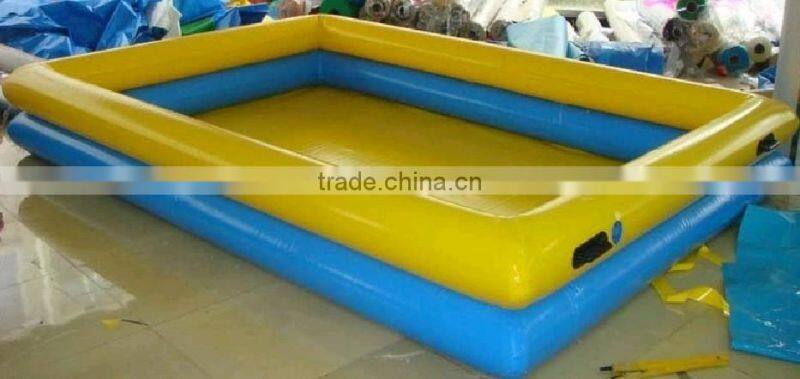 Children playing inflatable bouncing castle