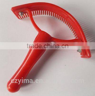 plastic sweat scraper with round handle