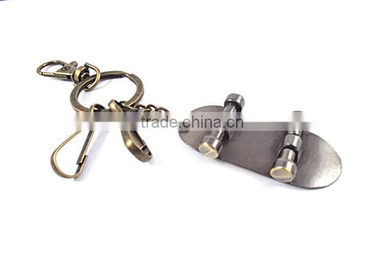 Factory oem custom logo skateboard alloy metal keychain models