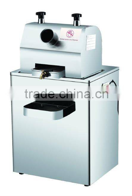 Electric sugar cane juice extractor