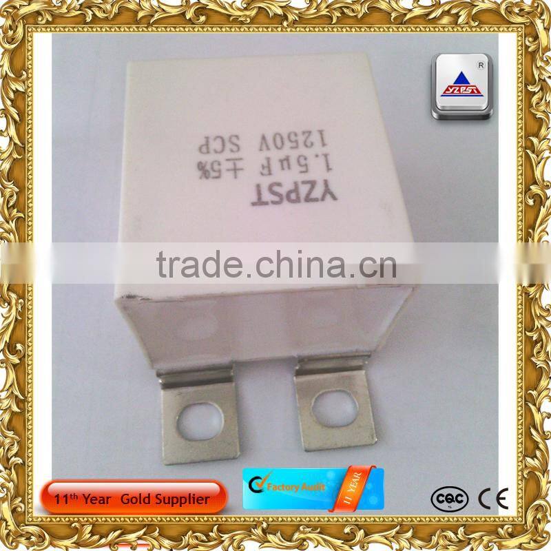 White plastic shell filled with solidified epoxy resin capacitors