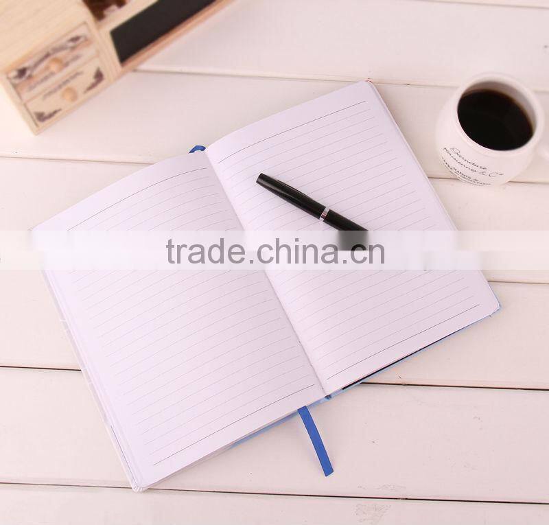 small notebook with pen