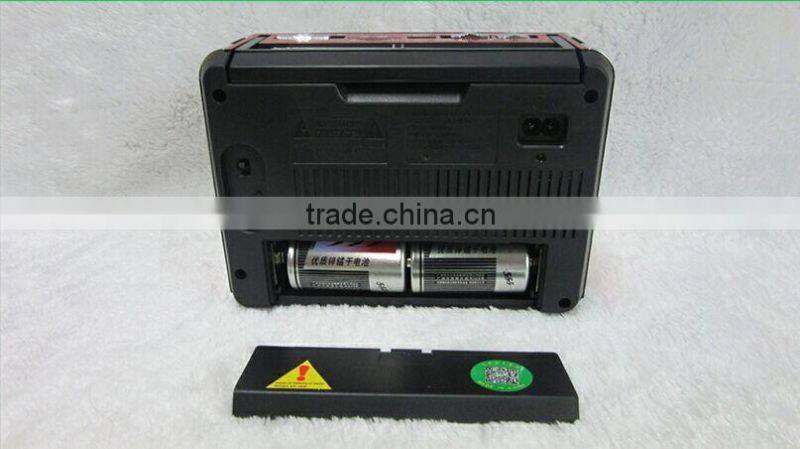 2014 China hot sell factory portable speaker am fm pocket radio with alarm clock