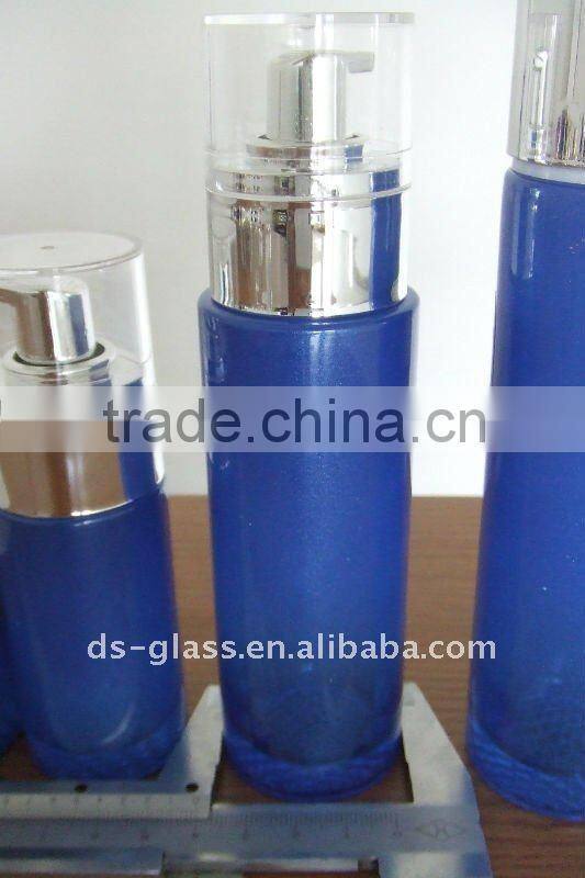 blue-green cylinder shaped glass cosmetic containers with pump nozzle