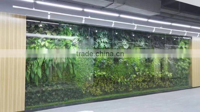 Fashion artificial grass plants store design wall