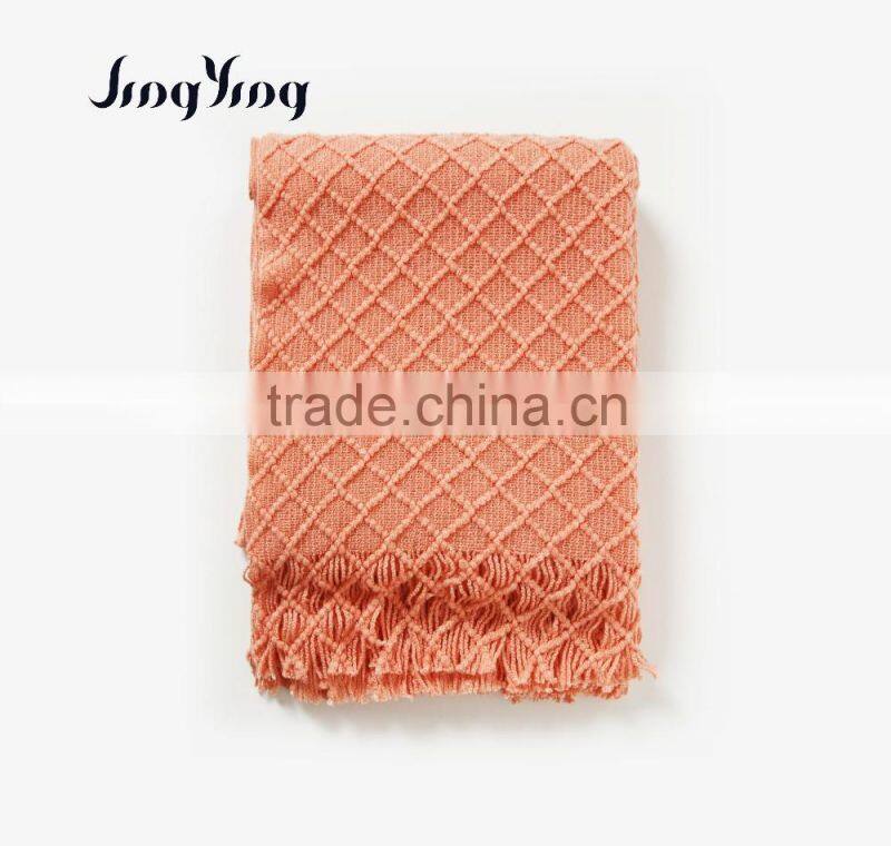 Hot sale orange color acrylic single side check jacquard crochet blanket with short tassels