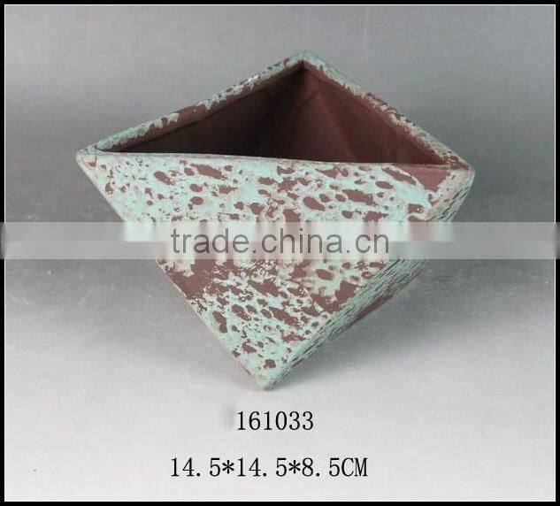 green glazed stoneware flower pot