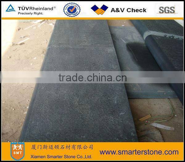 Bush hammered paving stone basalt with honeycombs