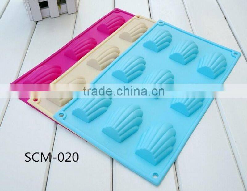 Hot sale food grade FDA and LFGB 9 hole shell shape colorful silicone oven cake mold
