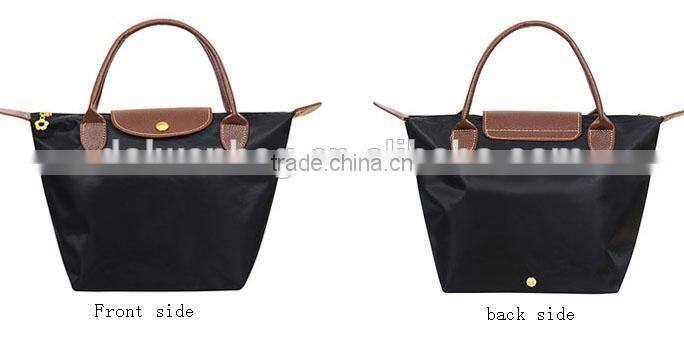 Foldable nylon shopping bag with zipper and button closure