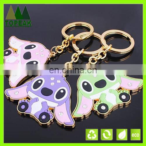 Promation cute cartons rubber gift metal keychain key ringsr key chains