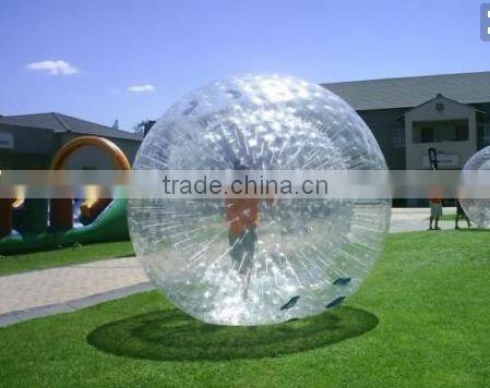 recreation and sport of rolling downhill inside an orb,transparent plastic zorb ball