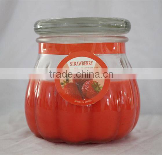 Scented candle in glass jar with lid