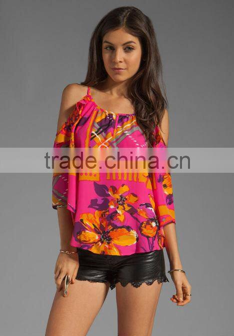 100% poly ruffle trim top