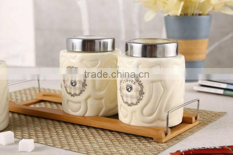 3pcs ceramic canister set with embossed design & bamboo stand