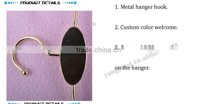 Gold metal hanger with clips for bikini clothes