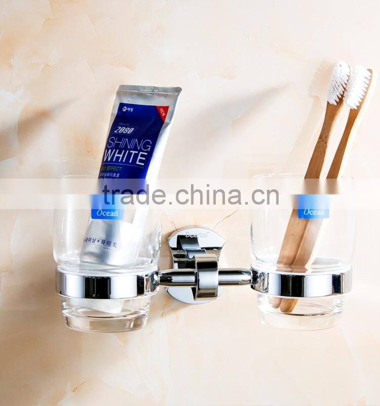 bathroom accessory with brass double cup holder for hotel family use.