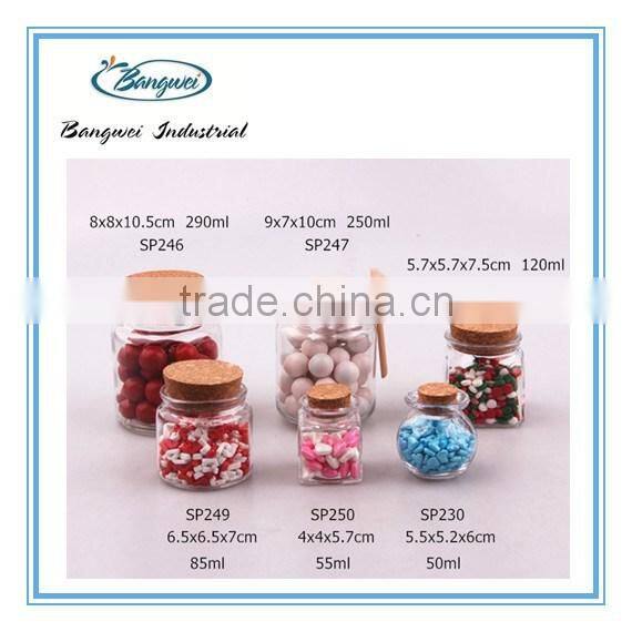 glass spice jar with wooden lid and spoon