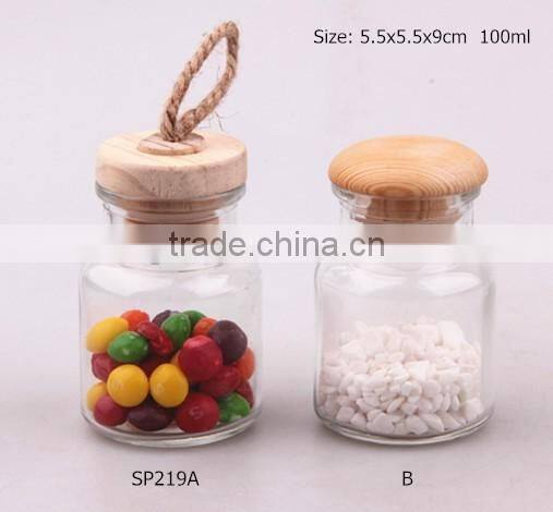 glass spice jar with 2 different wood lid