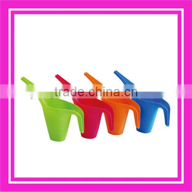 small plastic watering can
