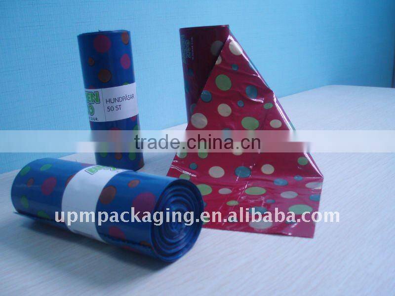 Colored plastic sack bag on roll for carry