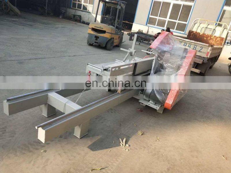 Best feedback table saw sliding moving smooth cutting log saw mill machine