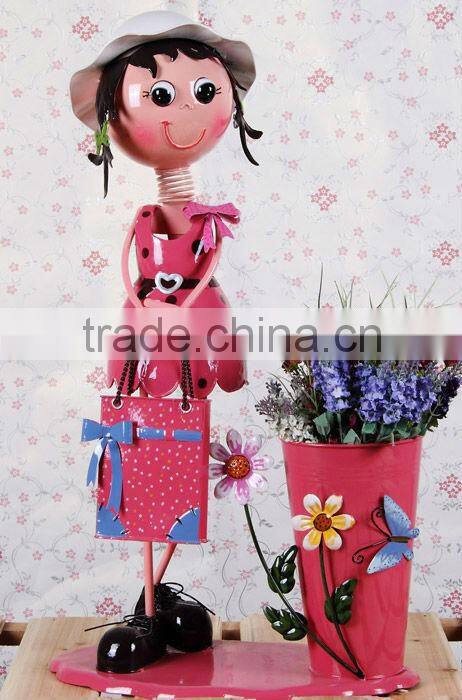 metal doll with flower used for home decor