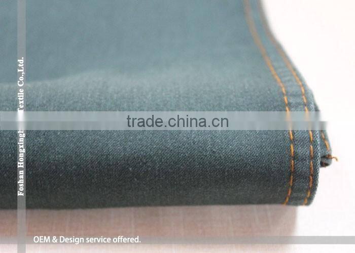 wholesale dark green stone washed denim fabric to Bengal