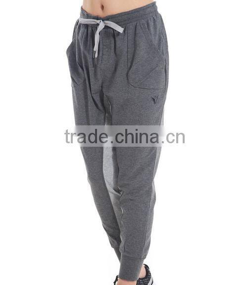 Women deep flowers grey trousers