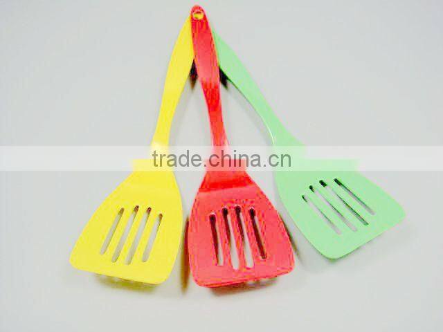 Yellow melamine spoon kitchenware cookware