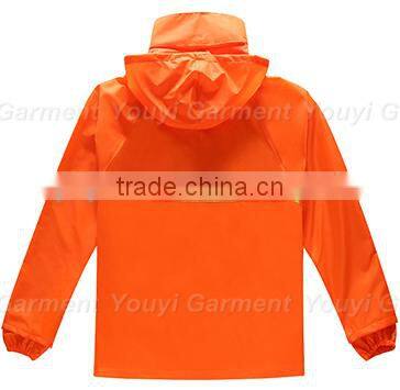 orange 100% waterproof raincoat with hood