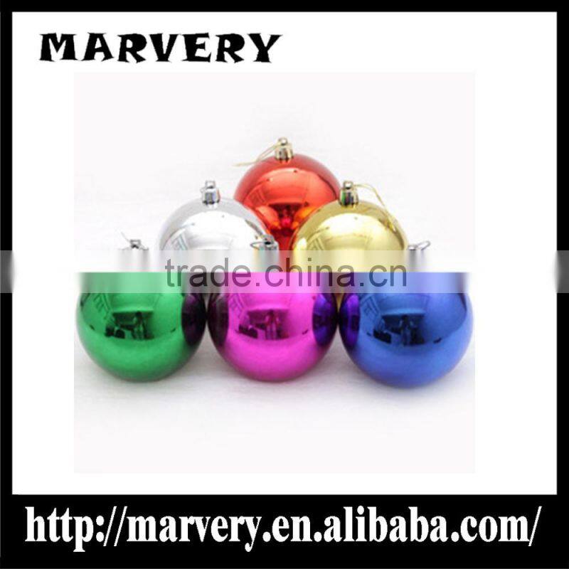 Christmas decorating the Christmas tree to hang Christmas ball pendant