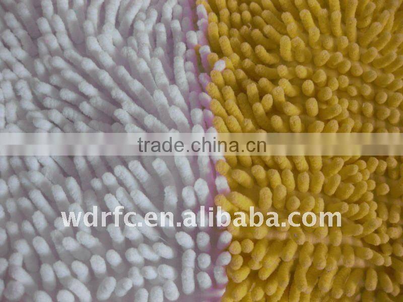 Pile rug fabric