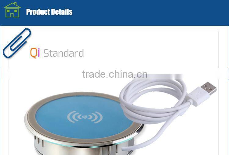 New smartphone Qi desktop wireless charger embedded on the furniture table