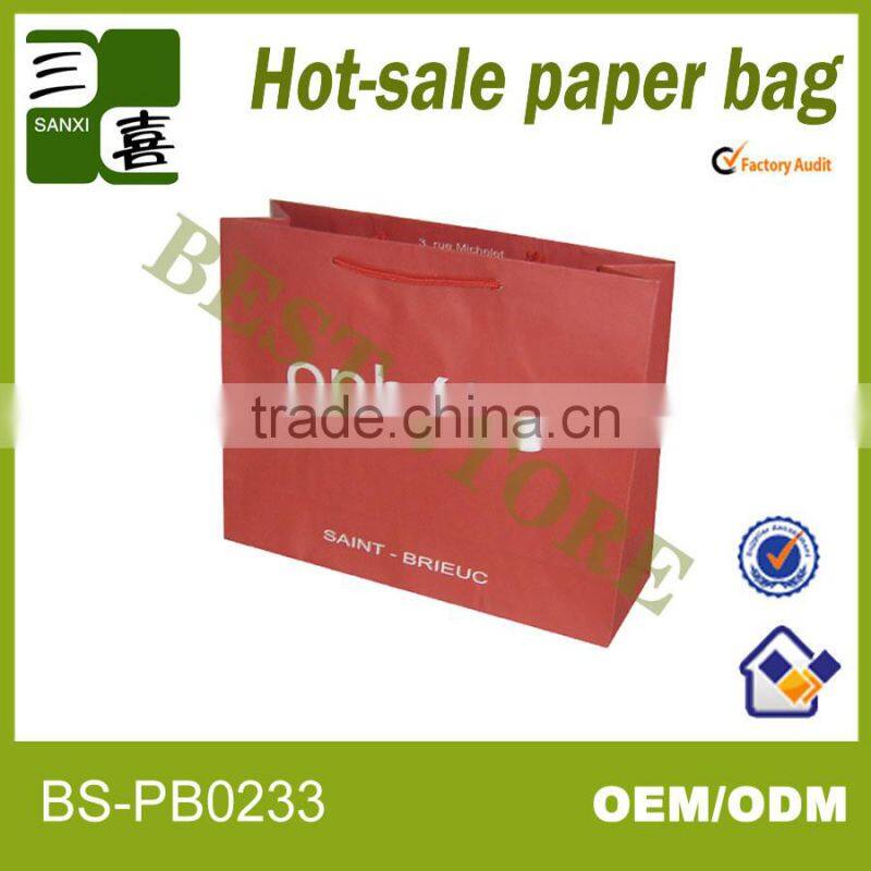 red printed paper gift carry bag with ribbon