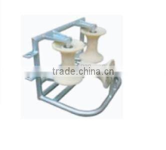 Stringing equipment corner ground roller, conduit cable roller
