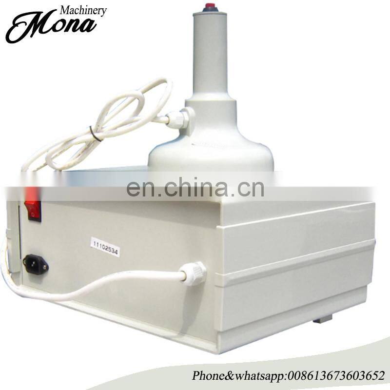Hot selling sealing machine/electromagnetic Induction aluminum foil sealing gasket sealing machine