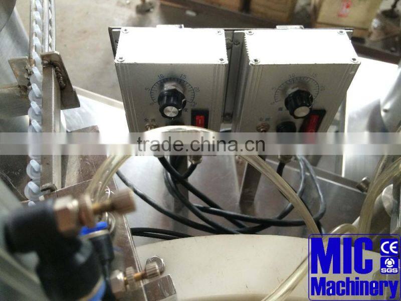 Micmachinery easy control liquid filling machine 30ml Oral liquid filling machine Vial filling plugging capping machine