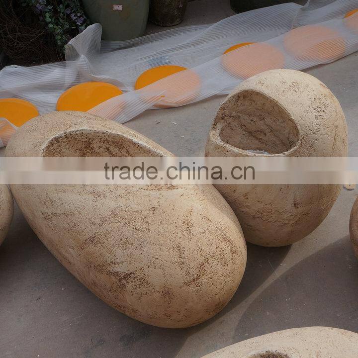 Large stone egg flowerpot
