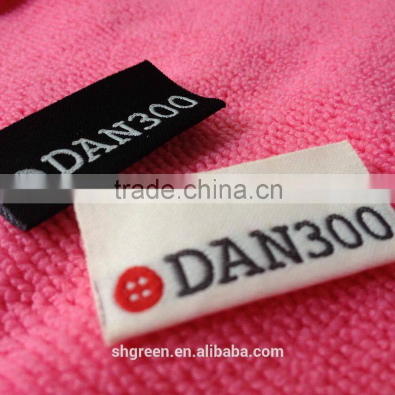 high density t-shirt bottom center fold woven label
