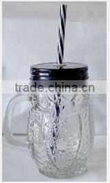 Clear mason jar mug with handle and straw lid embossed round glass bottle