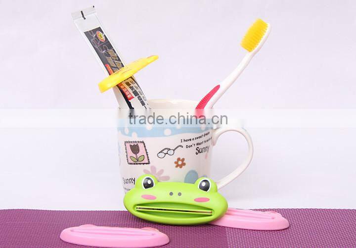 lovely cartoon toothpaste squeezer Dispenser Rolling Holder tools