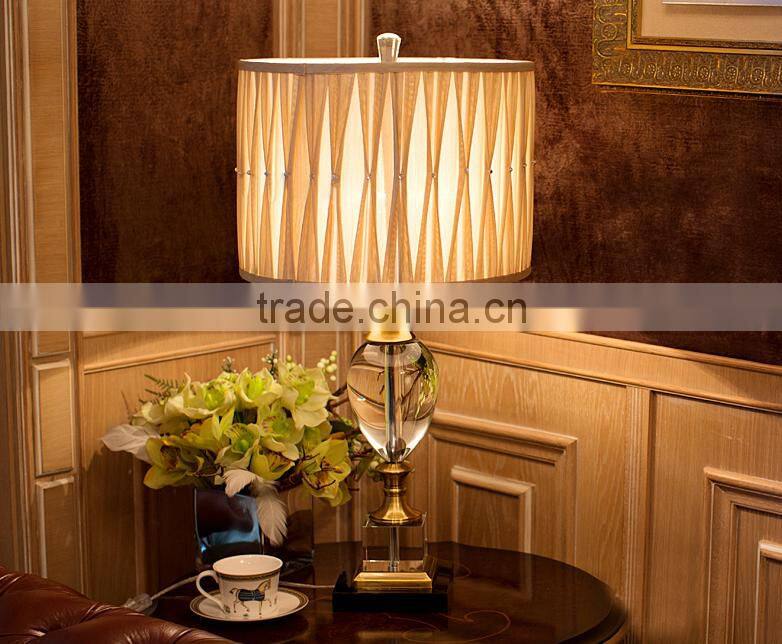 Gold plated metal clear K9 crystal table lamp with round fabric lampshade