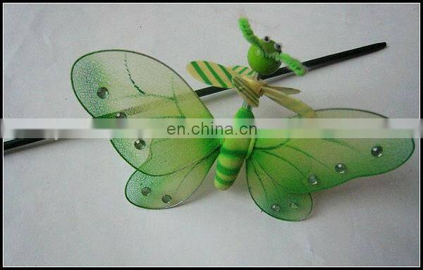 Green butterfly with small pinwheel garden stick decoration
