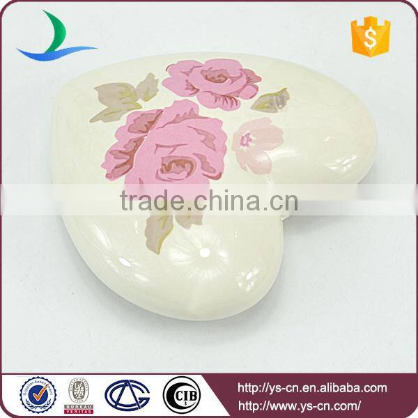 white heart shape hanging with pink flower decal