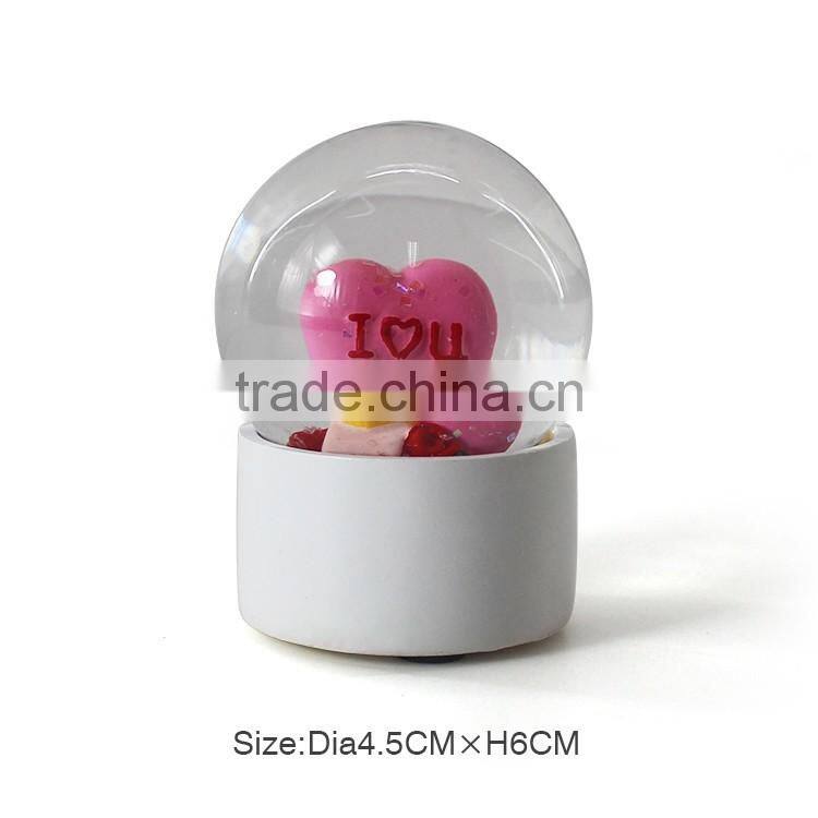 Small custom plastic snow globe