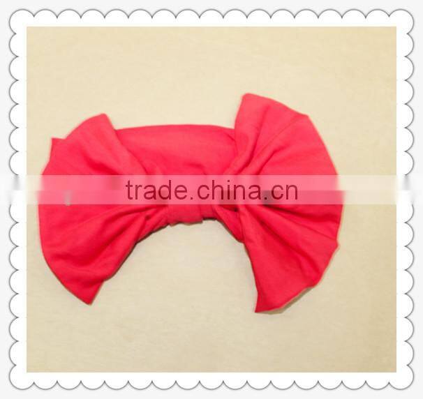 Wholesale Lovely Pom Pom Headband In Plain Pale Pink