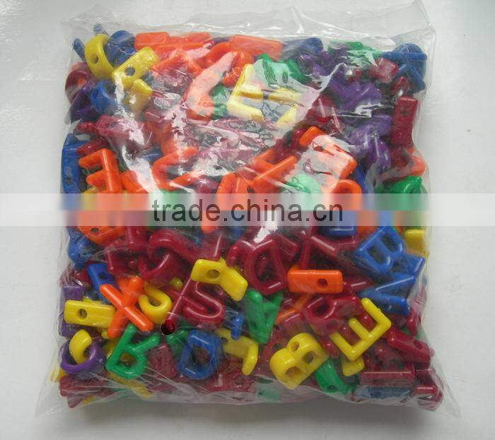 Small plastic alphabet letter toys as a gift
