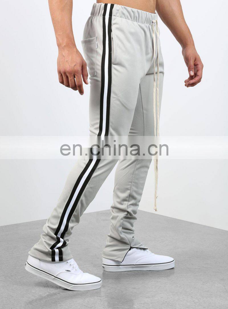DiZNEW OEM USA brand 94% Polyester 6% Elastane track pants with stripe