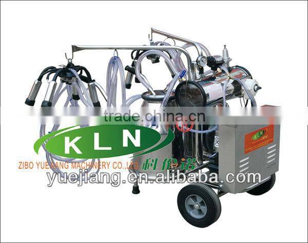 milking machine working with vacuum pump